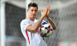 World Cup qualifying roundup: 
Poland on verge as Lewandowski sets record