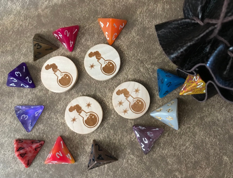 laser engraved potion tokens with a bunch of d4 dice