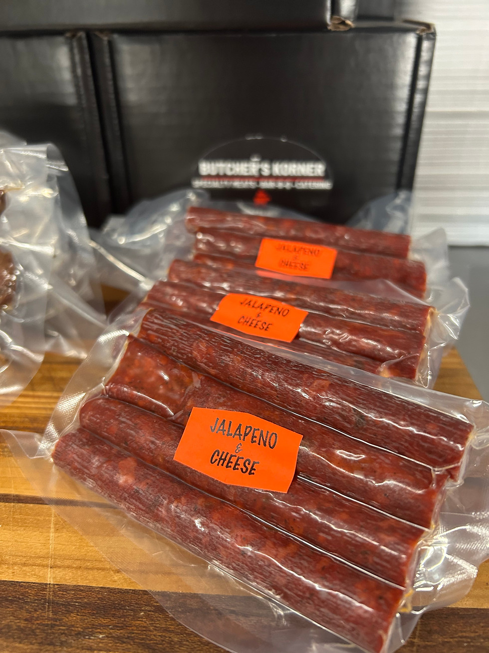 Two sealed packages of Texas snack sticks ready to ship from Butcher’s Korner in Nederland TX