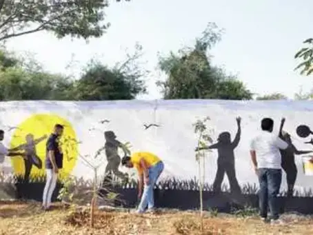 City youth beautifies village school