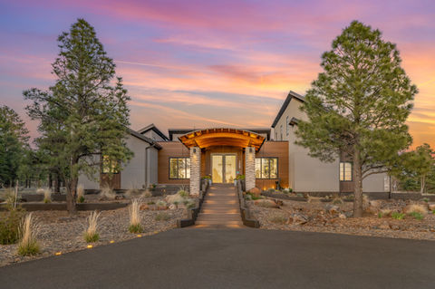 Front yard landscape installation at sunset for contemporary mountain home in Flagstaff Arizona