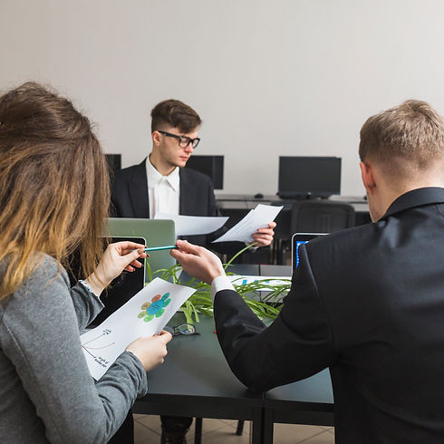group-businesspeople-working-graph-office.jpg