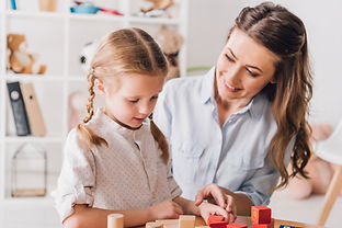 happy-mother-playing-blocks-with-little-child-2021-08-30-02-15-31-utc.jpg