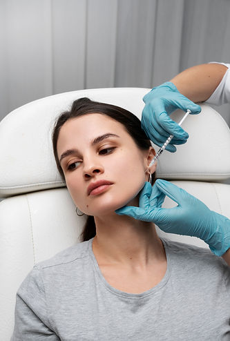 doctor-giving-woman-lip-fillers-high-angle.jpg