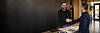 Carlos DeOliveira discussing a custom website and business systems project with a client