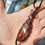 Thumbnail: Moroccan Seam Agate aged copper pendant