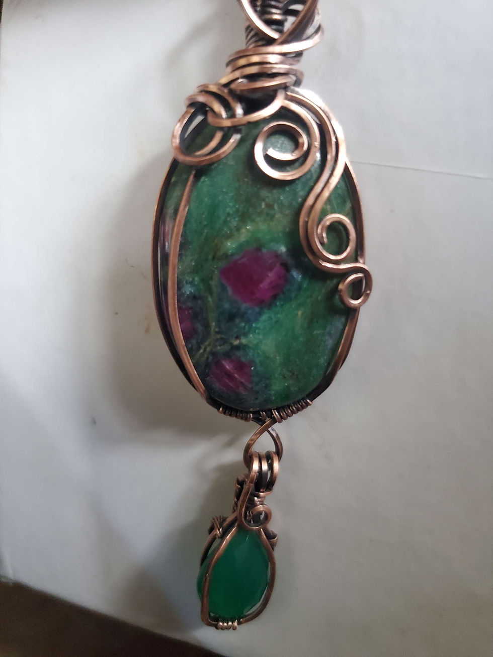 Thumbnail: Ruby in Fucshite with Chalcedony Accent in aged copper.
