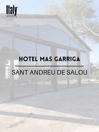 Tancament de vidre integral en estructura de pedra amb vistes exteriors