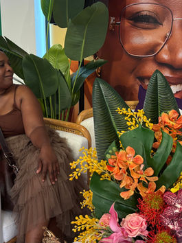 woman sitting at the Shea Moisture event