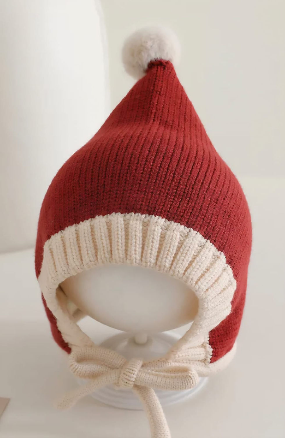 Thumbnail: Knitted elf beanie at with pompom