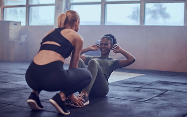 mobile-personal-trainers-doing-assisted-