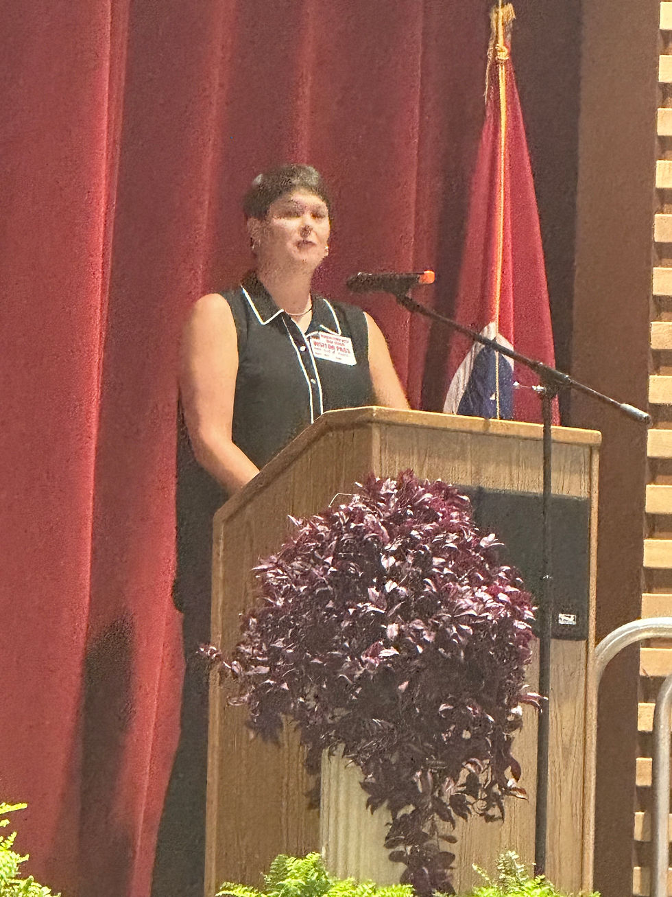 Bridget Graves giving a speech during the ceremony