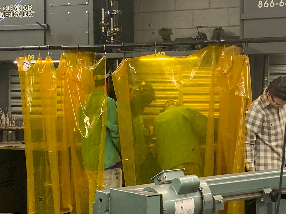 Students in Mr. Miller's Welding class working