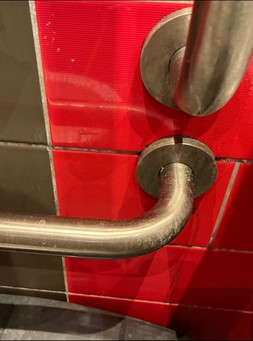 Dirty fittings in a public bathroom