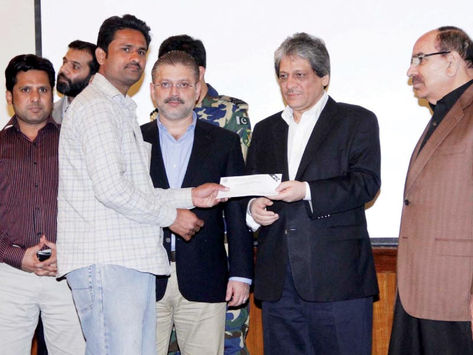 Malik Riaz Hussain Distributes Relief Cheques to Victims of Timber Market Fire Incident