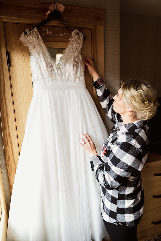 Bride getting ready for Banff Park Lodge wedding in Banff