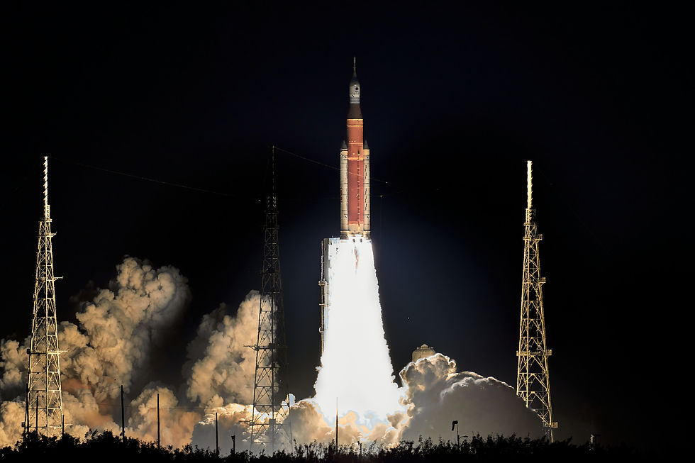 Artemis I Launches from Kennedy Space Center Pad 39B. Credit: John Winkopp