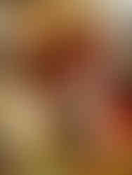 An assortment of baked goods at Back in the Day Bakery, a Black-owned bakery in Savannah, sit on a table in the bright sunshine