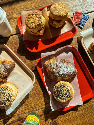 A spread of baked goods laid out on a table at Back in the Day Bakery