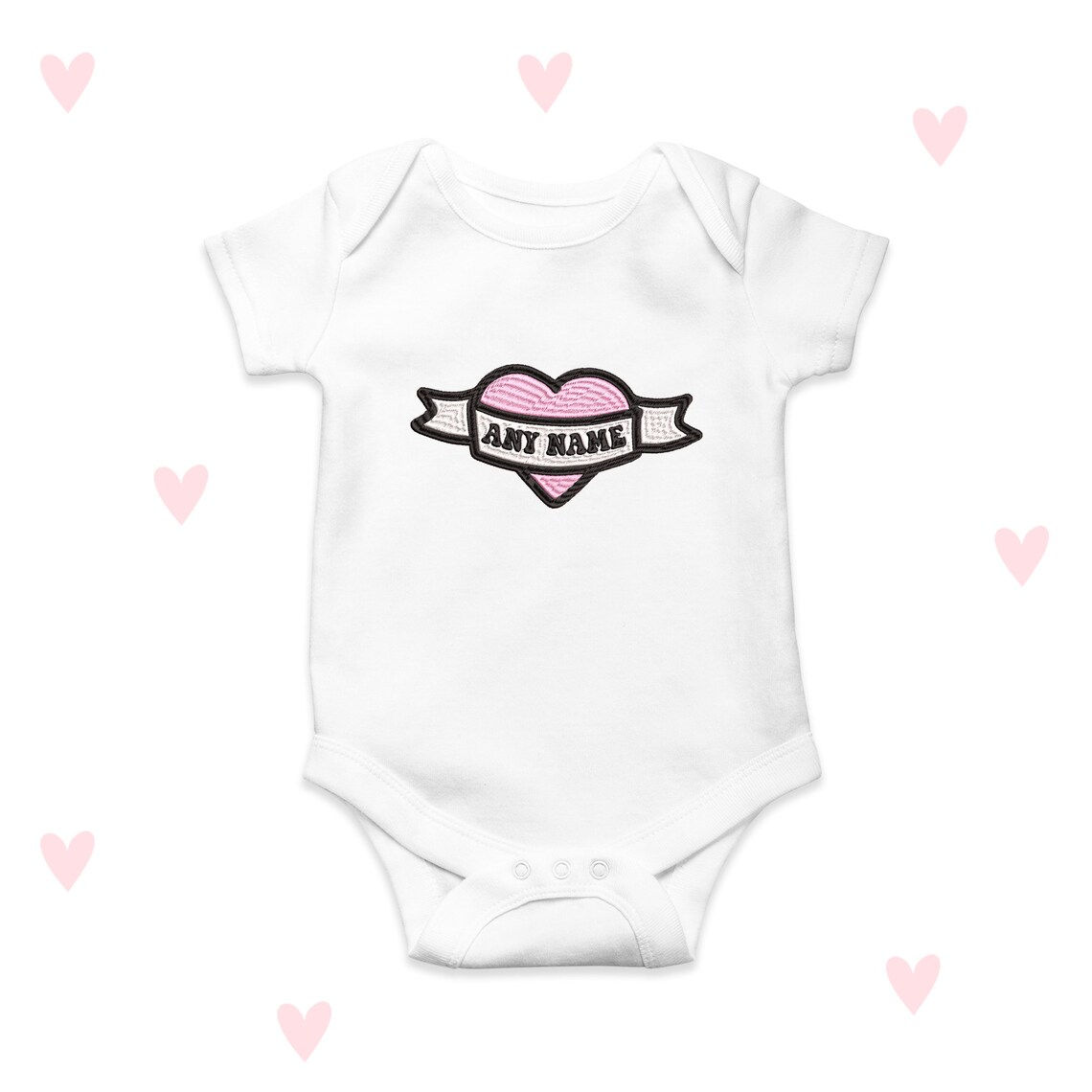 White babygrow pink heart in center