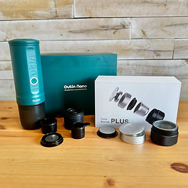 Espresso pouring from machine into cup