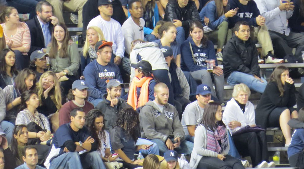Yankees fans watching the game