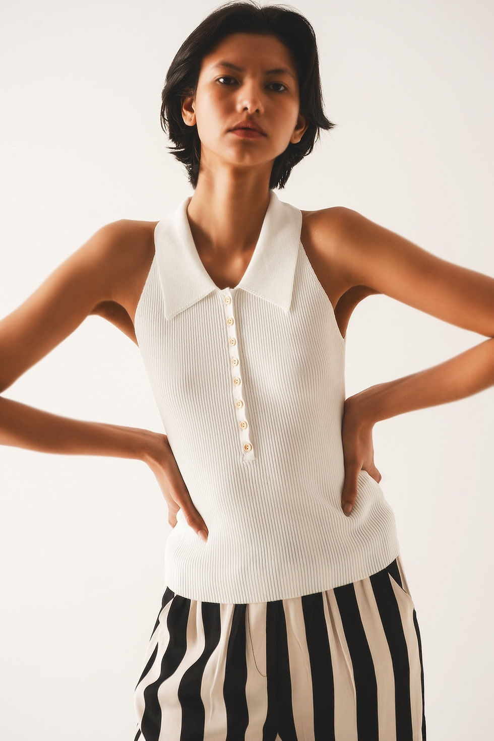 Thumbnail: Creamy Chic: The Ribbed Polo Knit Top