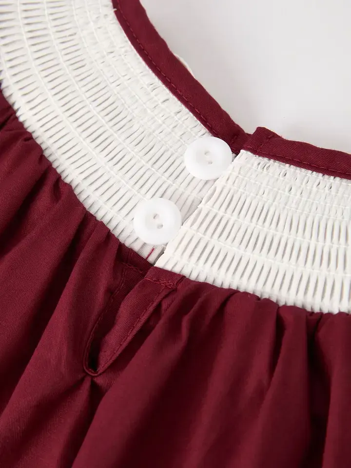 Thumbnail: Maroon smocked cross dress