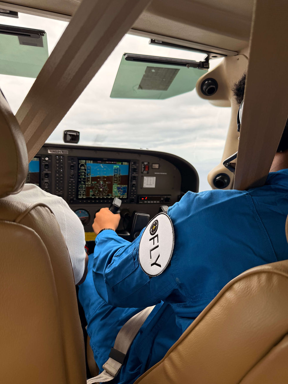 student in cockpit in an aviation camp