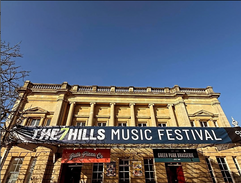 The 7 Hills Music Festival Banner on a building