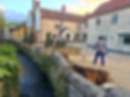Man walking dog at The litton pub in Somerset
