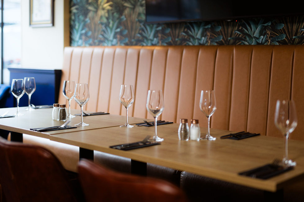 Breakfast table at The Vault in Buxton — a warm, welcoming spot for group mornings.