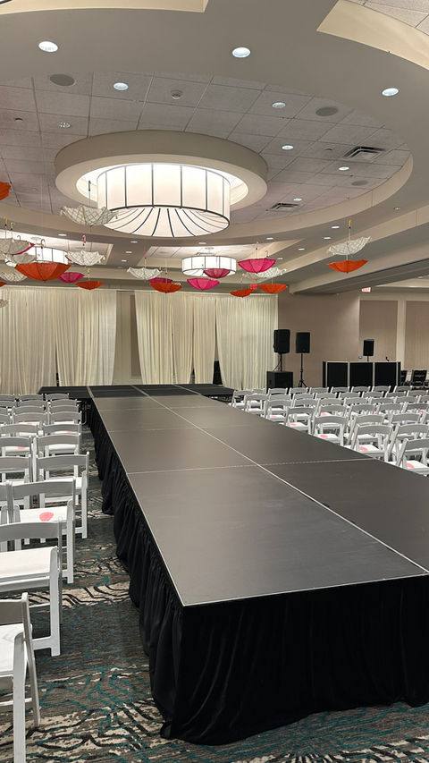 8'x32' catwalk stage and runway rental for fashion shows and weddings in Columbus Ohio by Eden Rentals