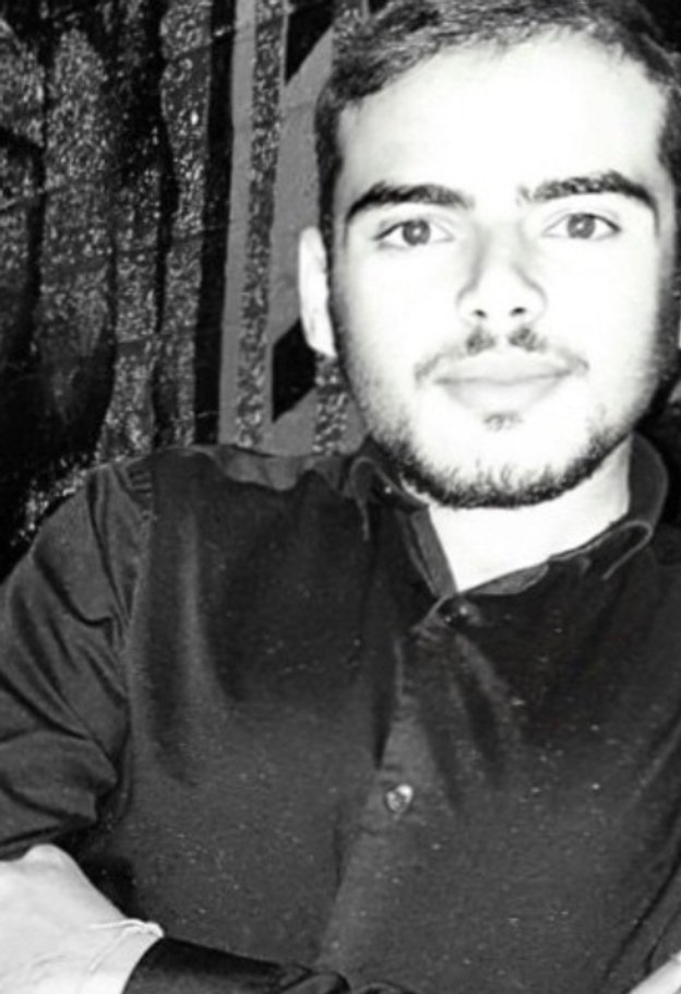 Black-and-white portrait of Ibrahim Humdi
