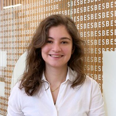 Portrait of Angela Fasana Vacca smiling, wearing a white blouse