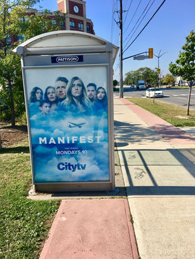 Outdoor bus shelter advertisement for the TV show Manifest on CityTV.
