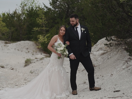 bride and groom pose during the filming of their wedding film at Stone Crest wedding venue in Mckinney, Texas