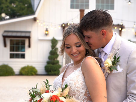 Bride and groom sharing a romantic moment outside Trickle Creek Ranch during their Texas wedding.