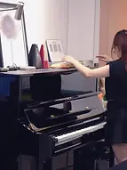 Piano Teacher preparing learning materials