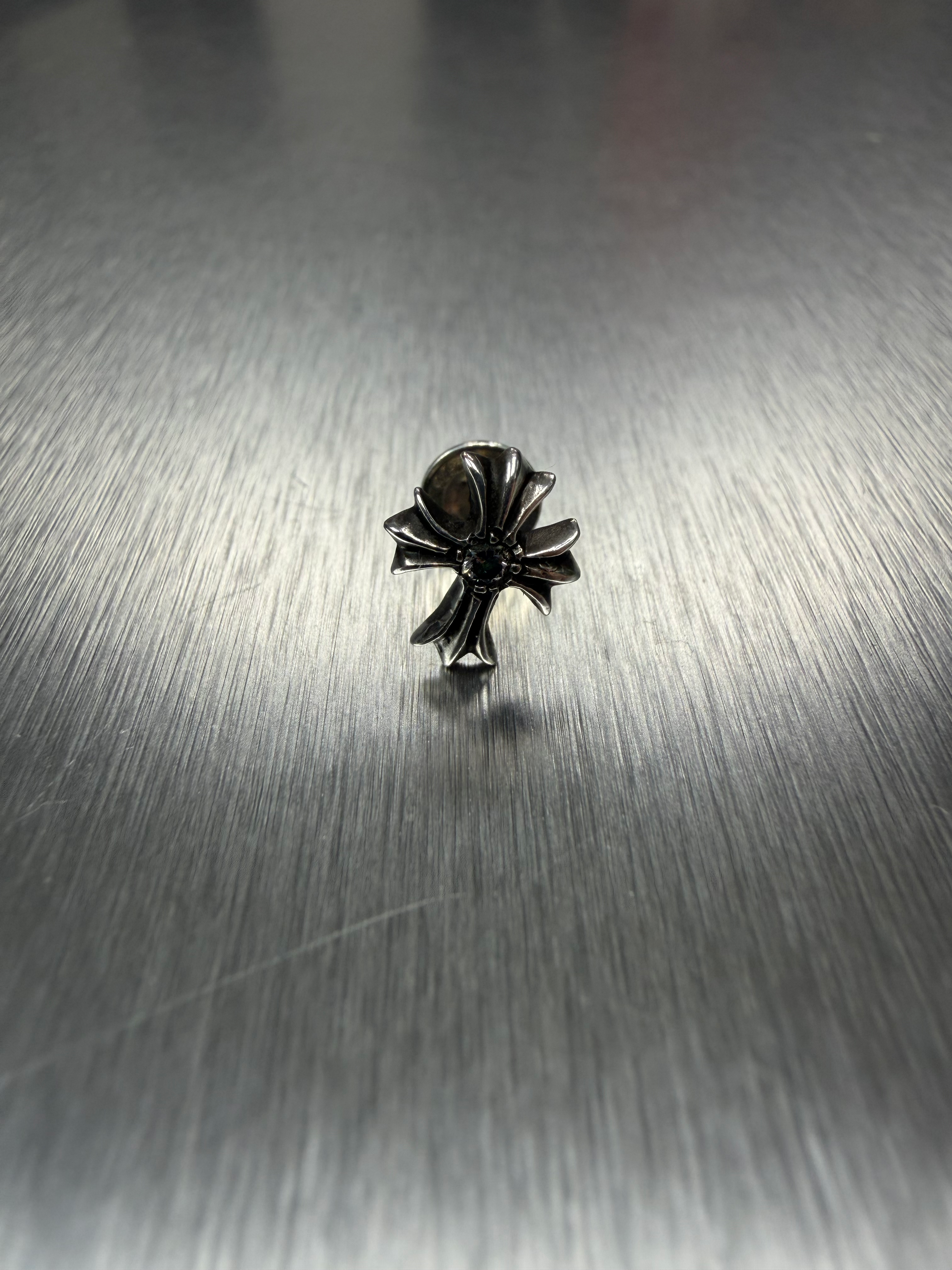 Chrome hearts cross earring with diamond