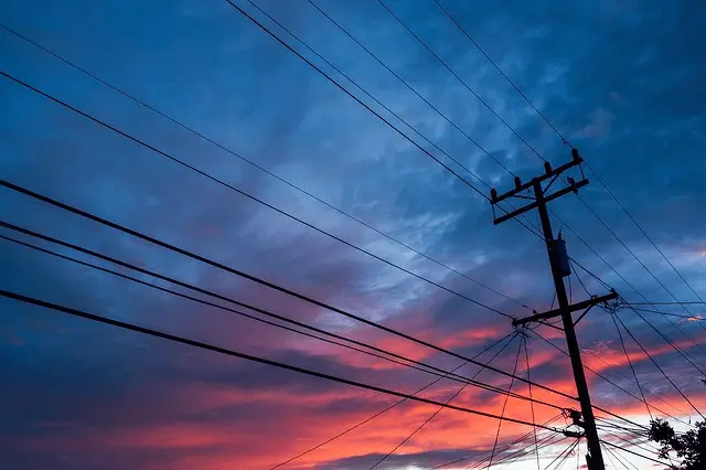 Old power grid line with many cables