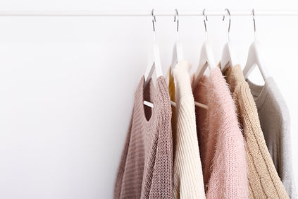 hanging sweaters.jpeg
