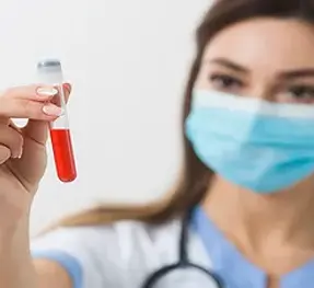 female-doctor-holding-blood-sample_23-21.webp
