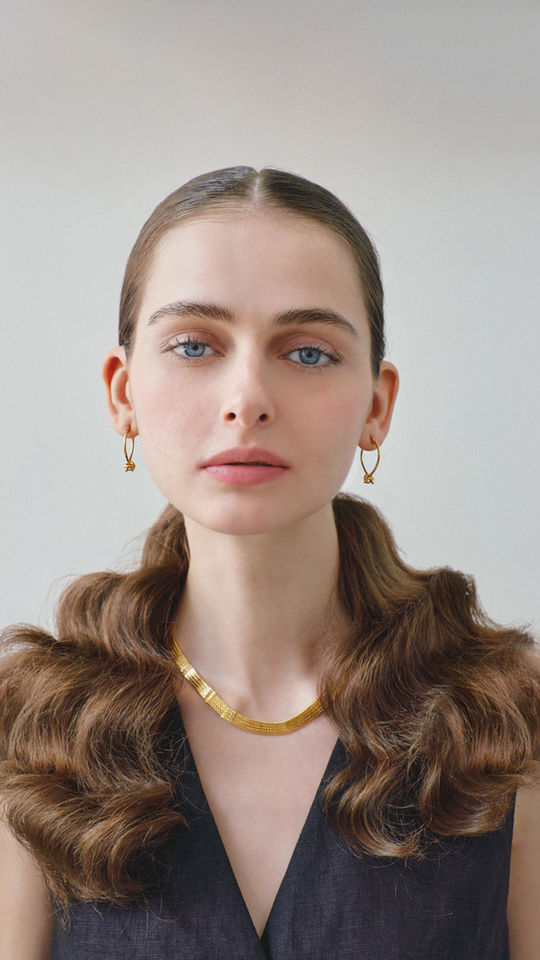 Golden Grace: Her Gemstone Jewels and Monochromatic Brilliance