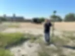 ground point surveying using GPS equipment near industrial facility for site measurement and data collection
