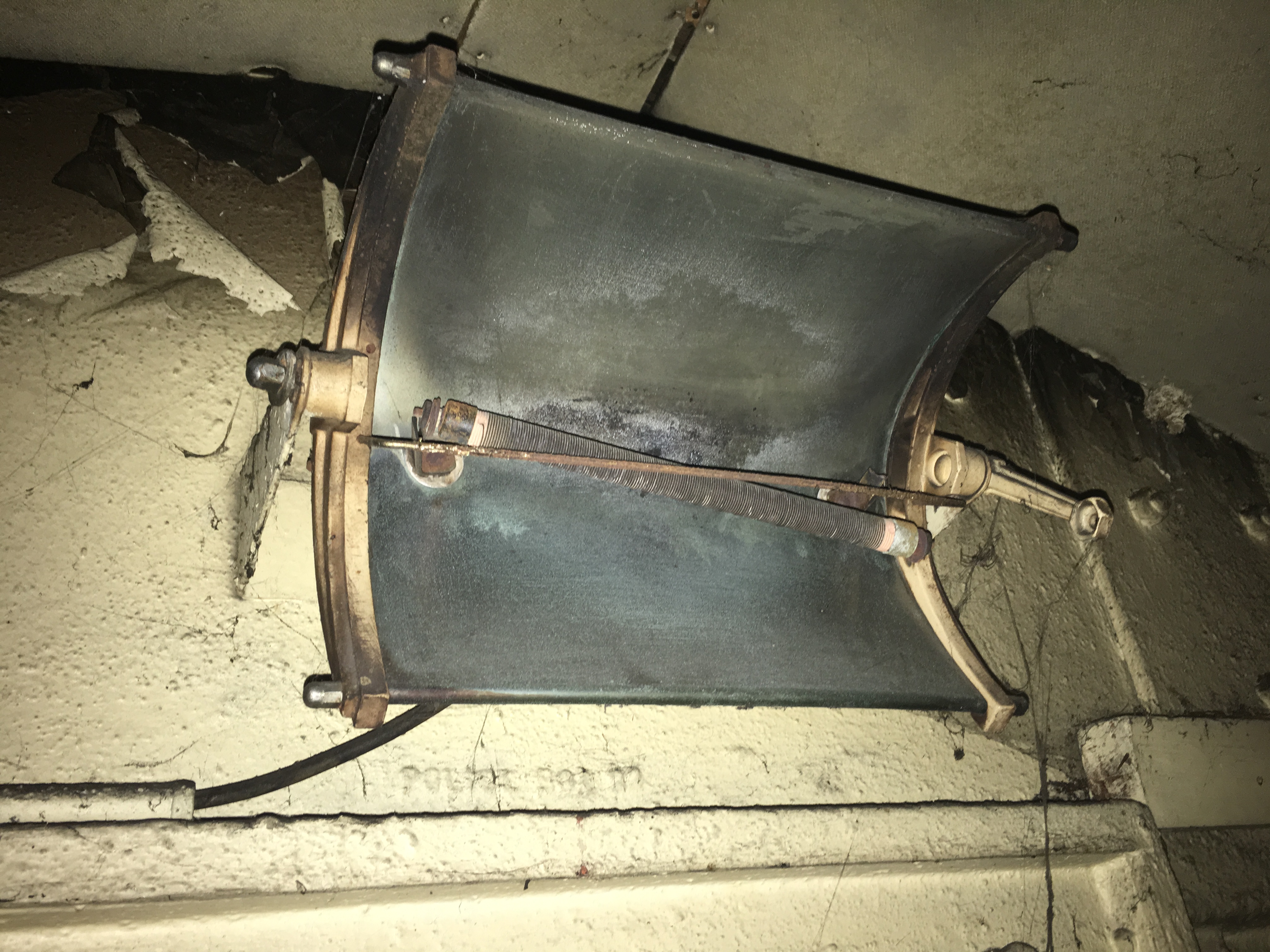 Electric fire mounted near ceiling