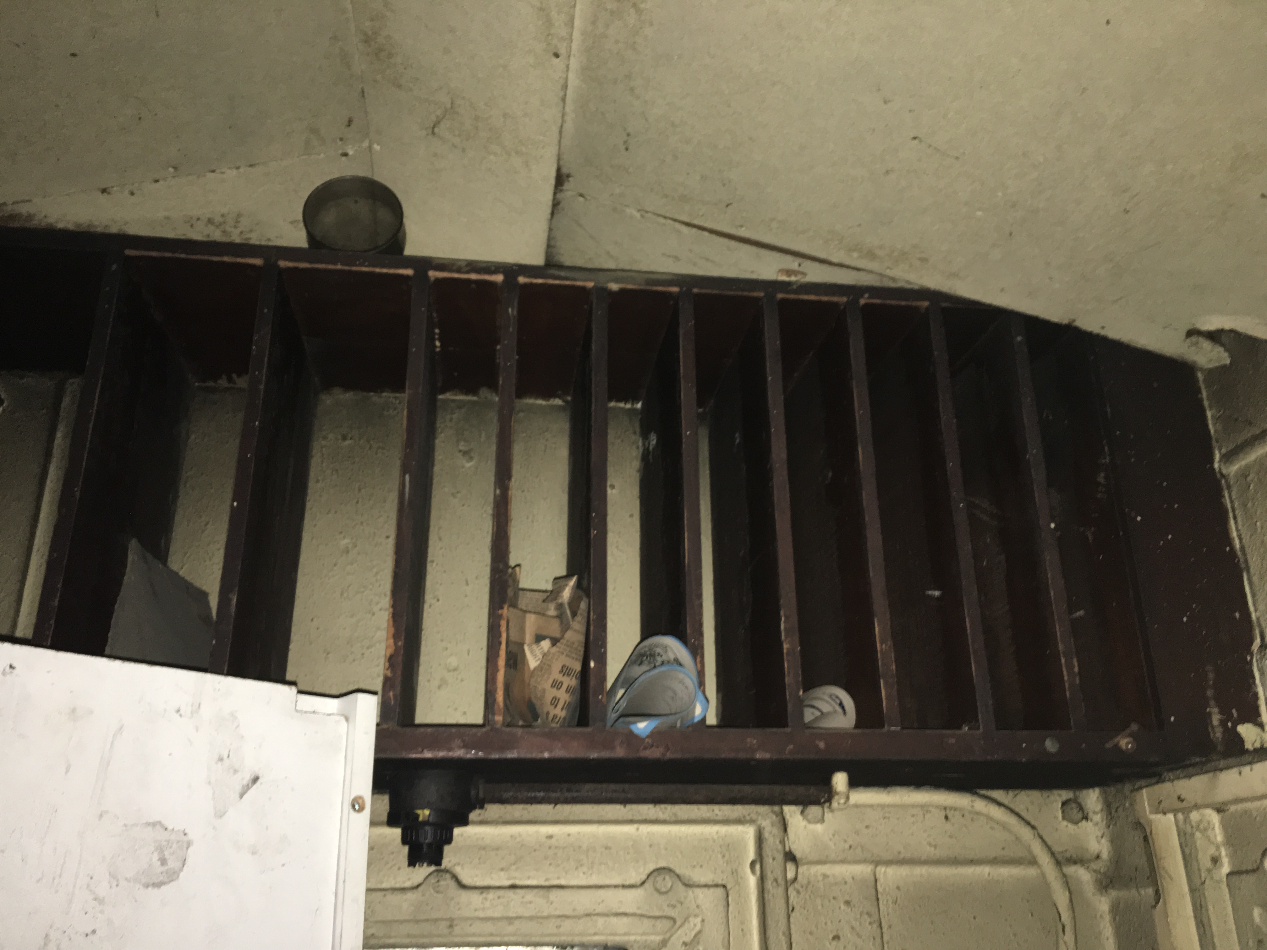 Shelf at ceiling, above desk