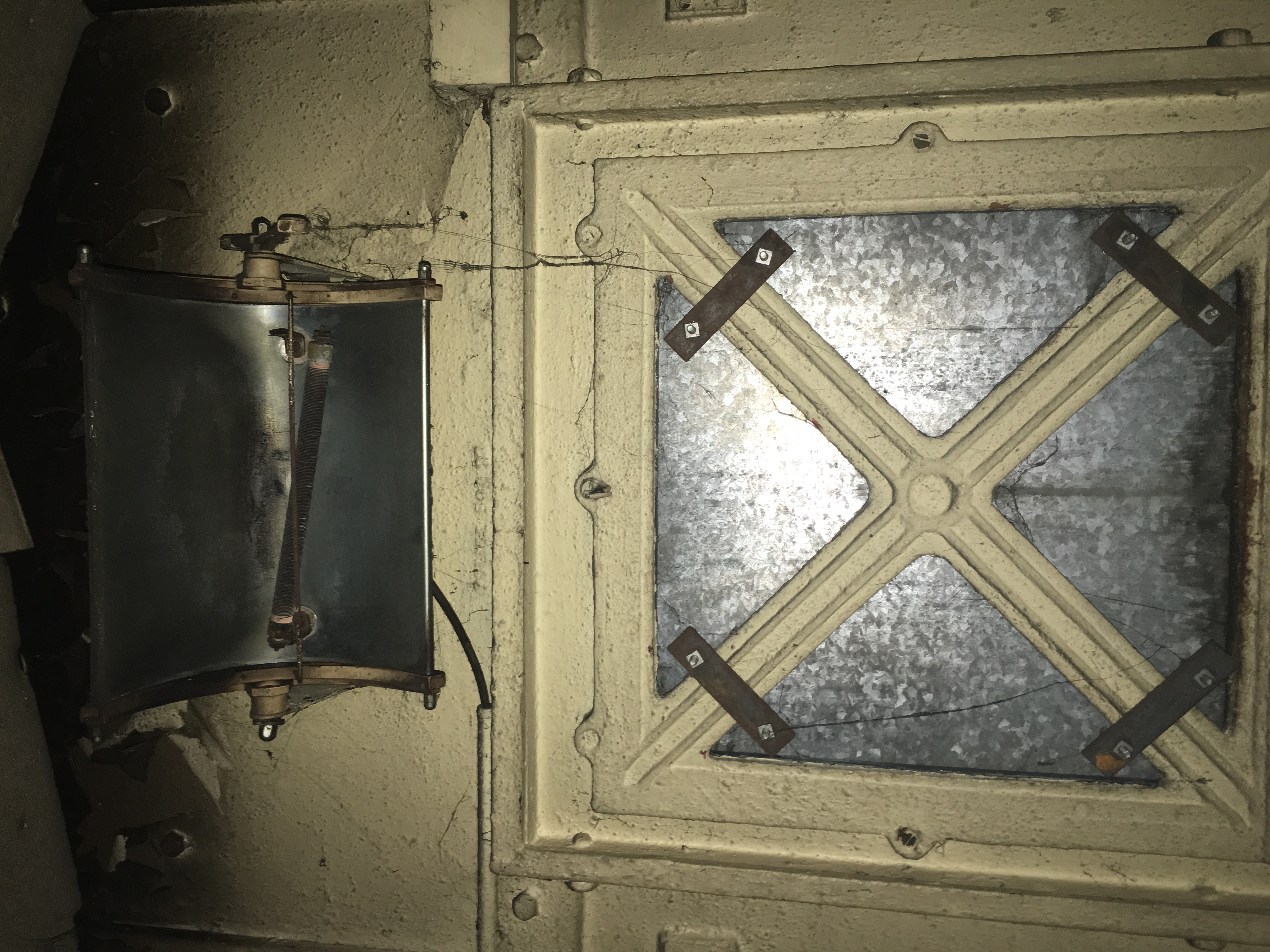 Electric fire over right-hand window
