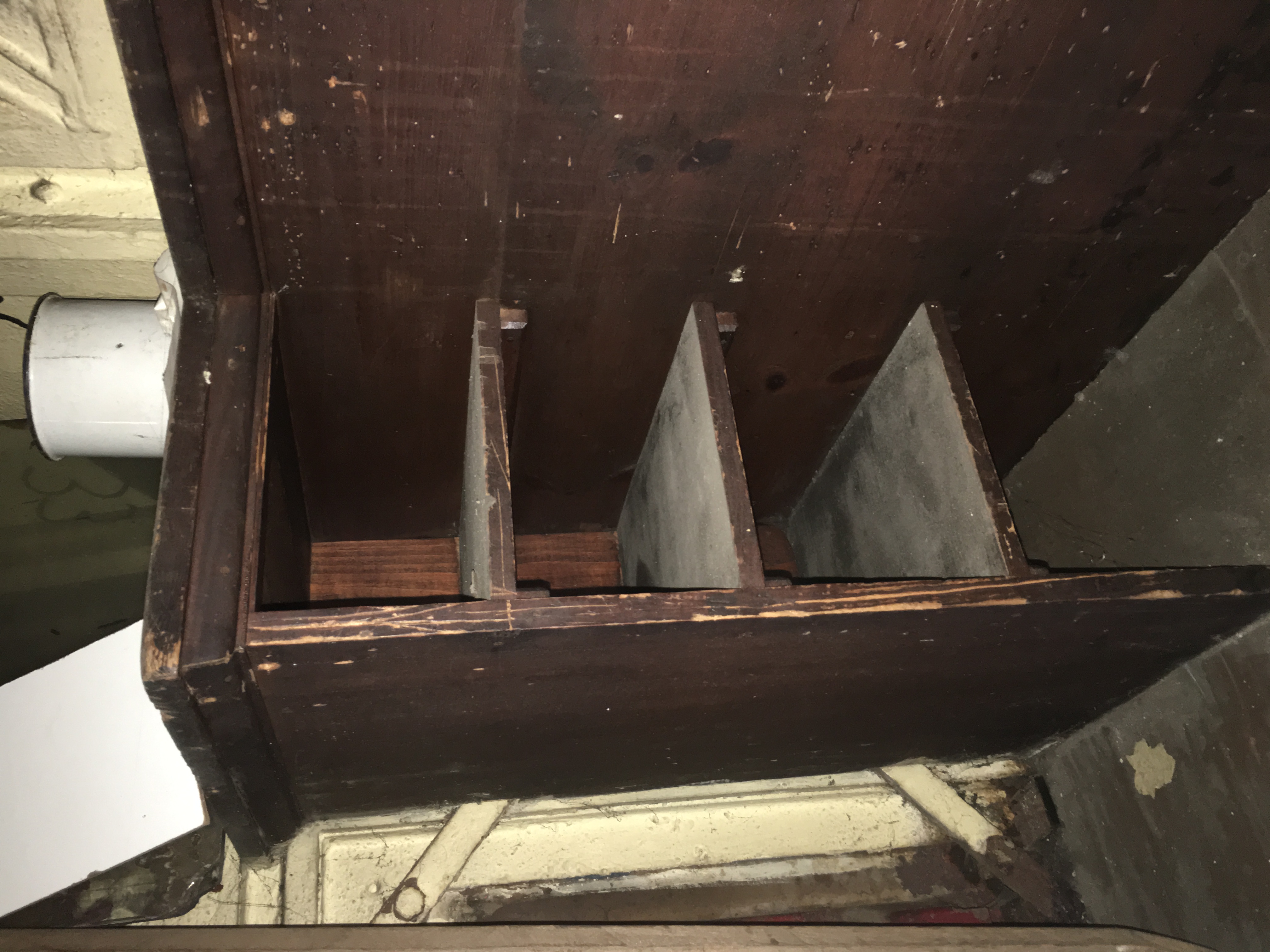 Four pigeon-holes on desk