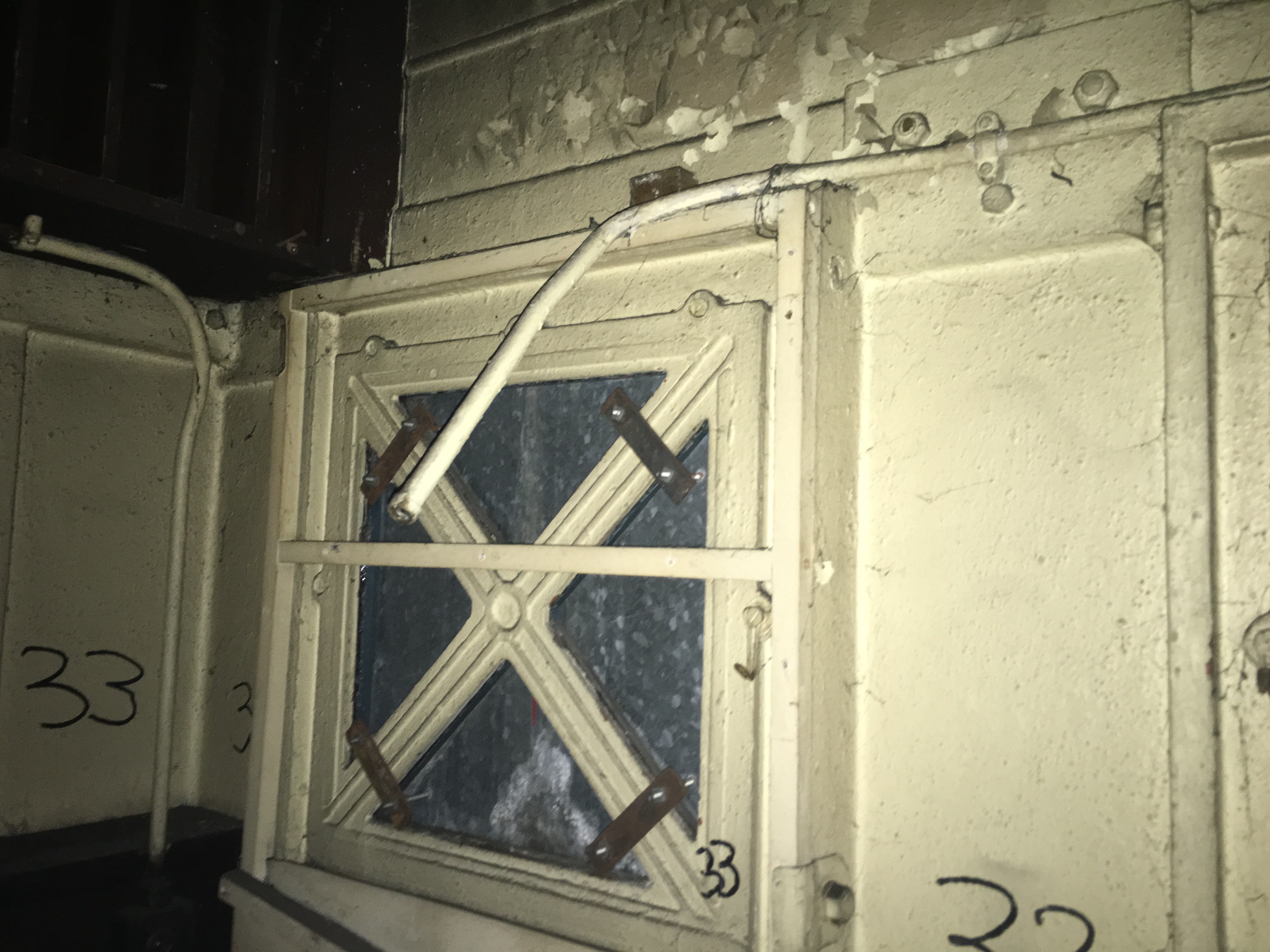 Another window covered by a plate